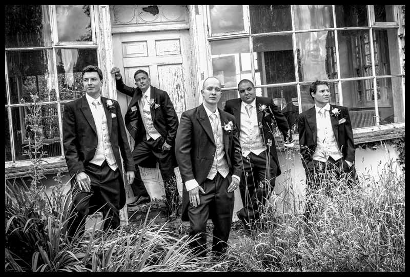 Cool, moody black and white group shot of the groomsmen.jpg
