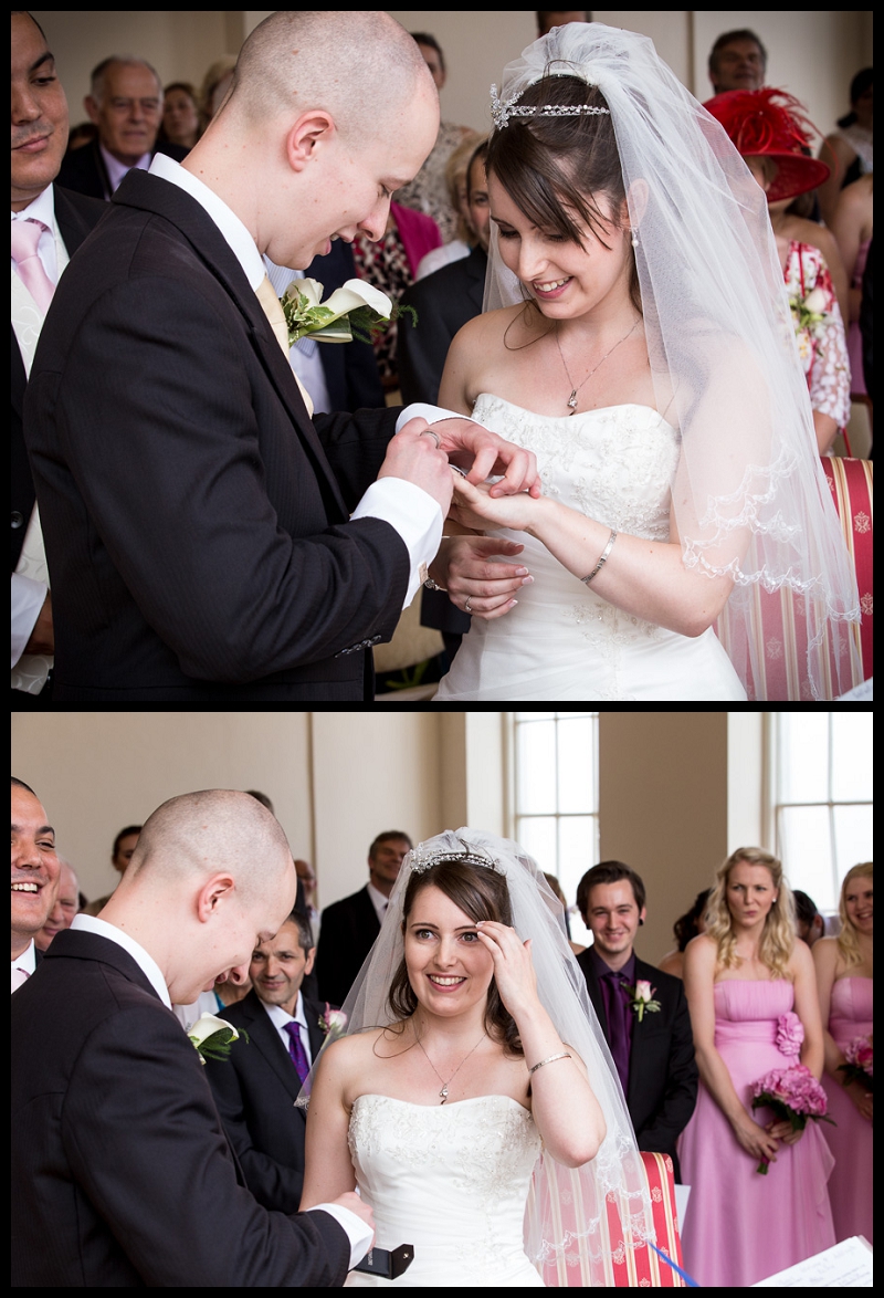 Groom putting ring on brides finger (2).jpg