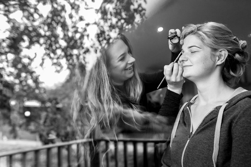 A bride having her make up applied at Rosewood Stud by Dani Roberts MUA