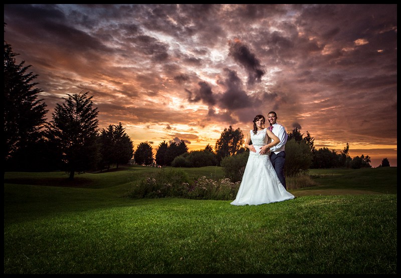 Bride and groom with dramatic Sunset on Channels golf course. Stunning wedding photography