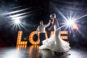 First dance in front of LOVE sign at a Chippenham Park Wedding 