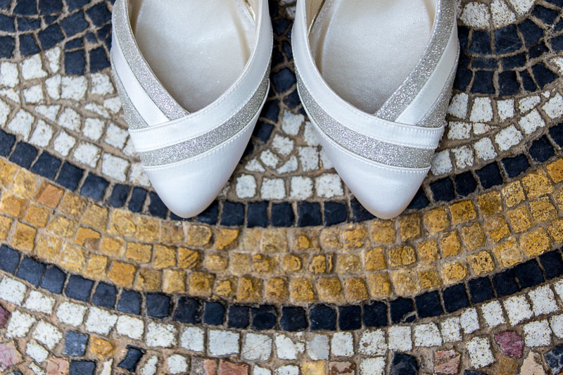 wedding shoes on mosiac floor