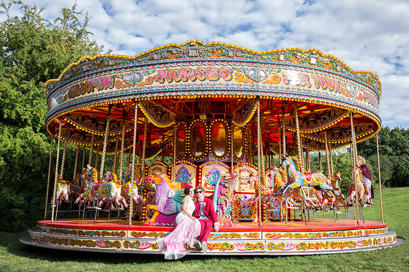 Wedding Photography Information image - bride and groom on carousel