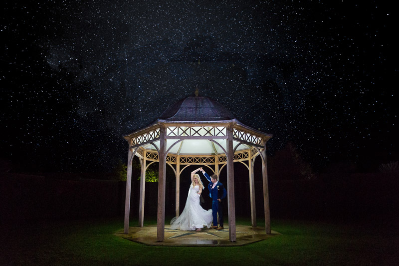 Couple dancing under the stars at a Chippenham Park Wedding